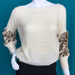 Sweater with faux fur